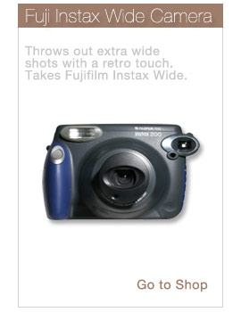 Fuji Instax Wide Camera -
						Throws out extra wide shots with a retro touch. Takes Fujifilm Instax Wide. - Go to Shop: http://shop.lomography.com/go/?where=shop&pro=fiw